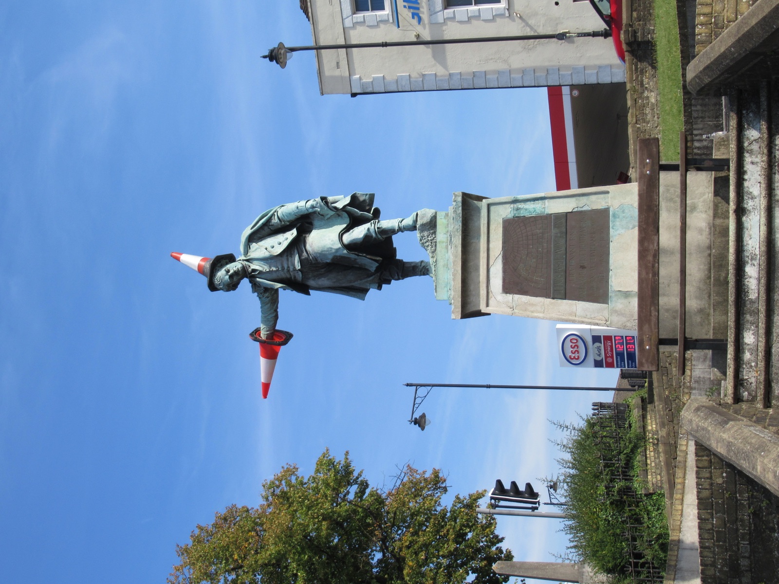 Thomas Waghorn statue in Chatham with traffic cones on its head and outstretched hand